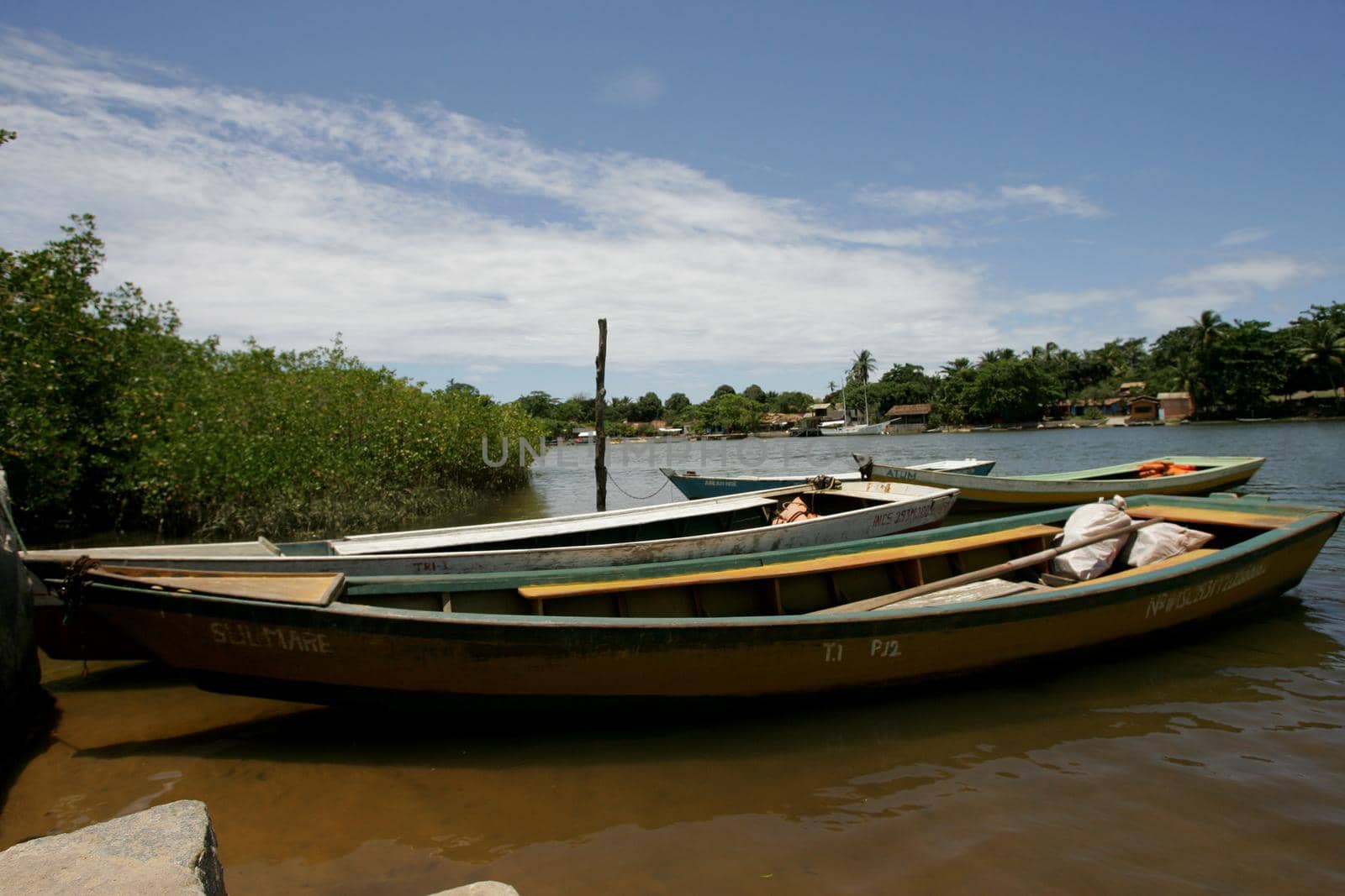 porto seguro, bahia, brazil - february 25, 2011: Fishing boat in the Caraiva district in the municipality of Porto Seguro, in the south of Bahia.