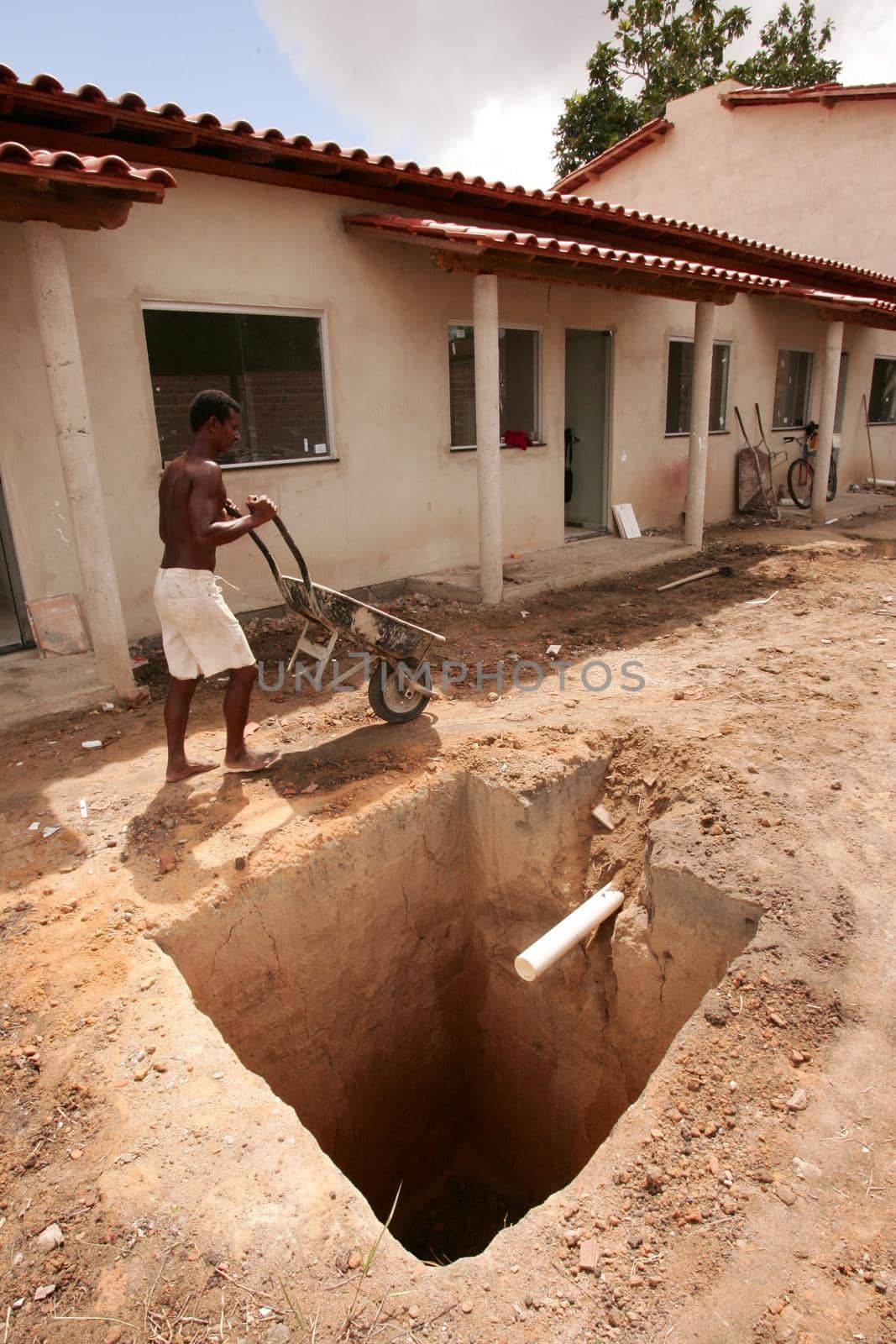 eunapolis, bahia, brazil - february 3, 2010: hole for construction of a septic tank in a residence in the city of Eunapolis.