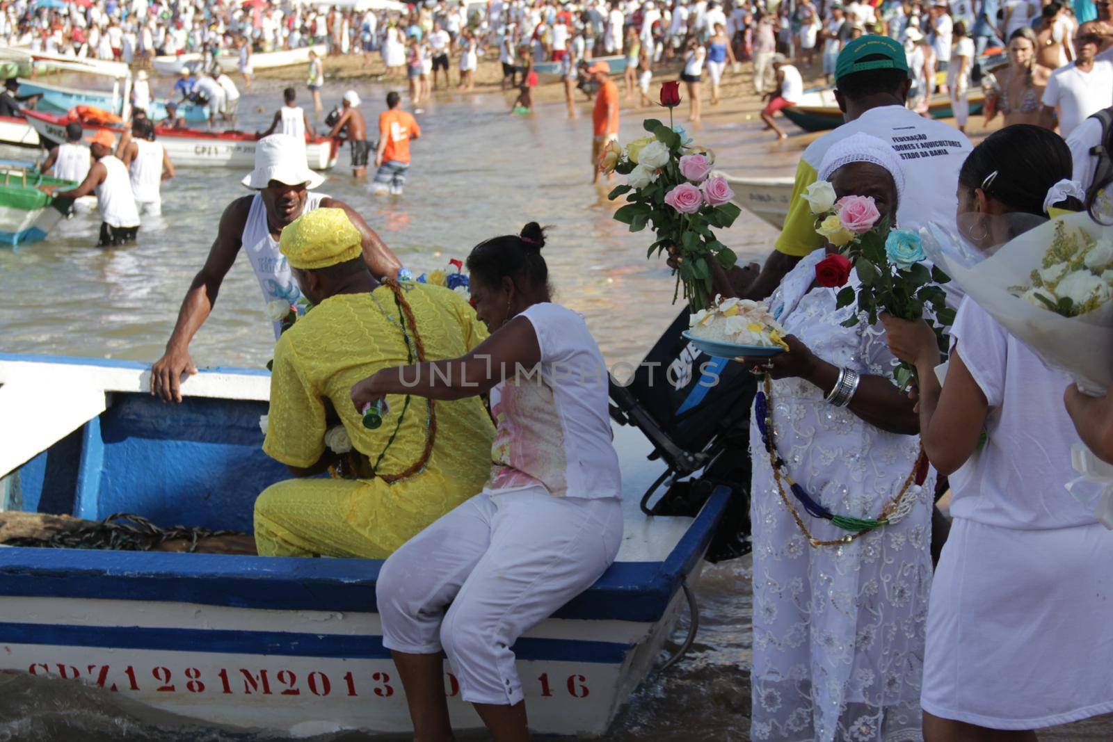 salvador, bahia, brazil - february 2, 2015: Candomble devotees and supporters of the African matriaz religion pay tribute to the orixa Yemanja in the city of Salvador.