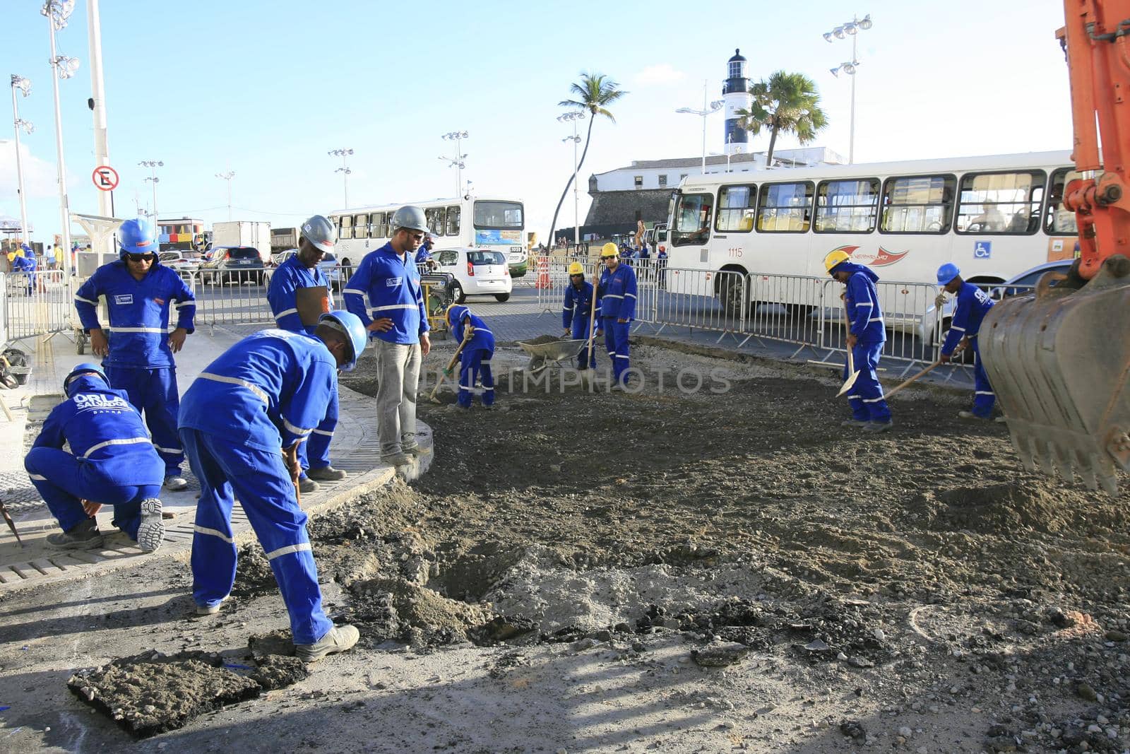 salvador, bahia, brazil - march 6, 2014: Workers working on street stretch revitalization works in Barra neighborhood in Salvador city.
