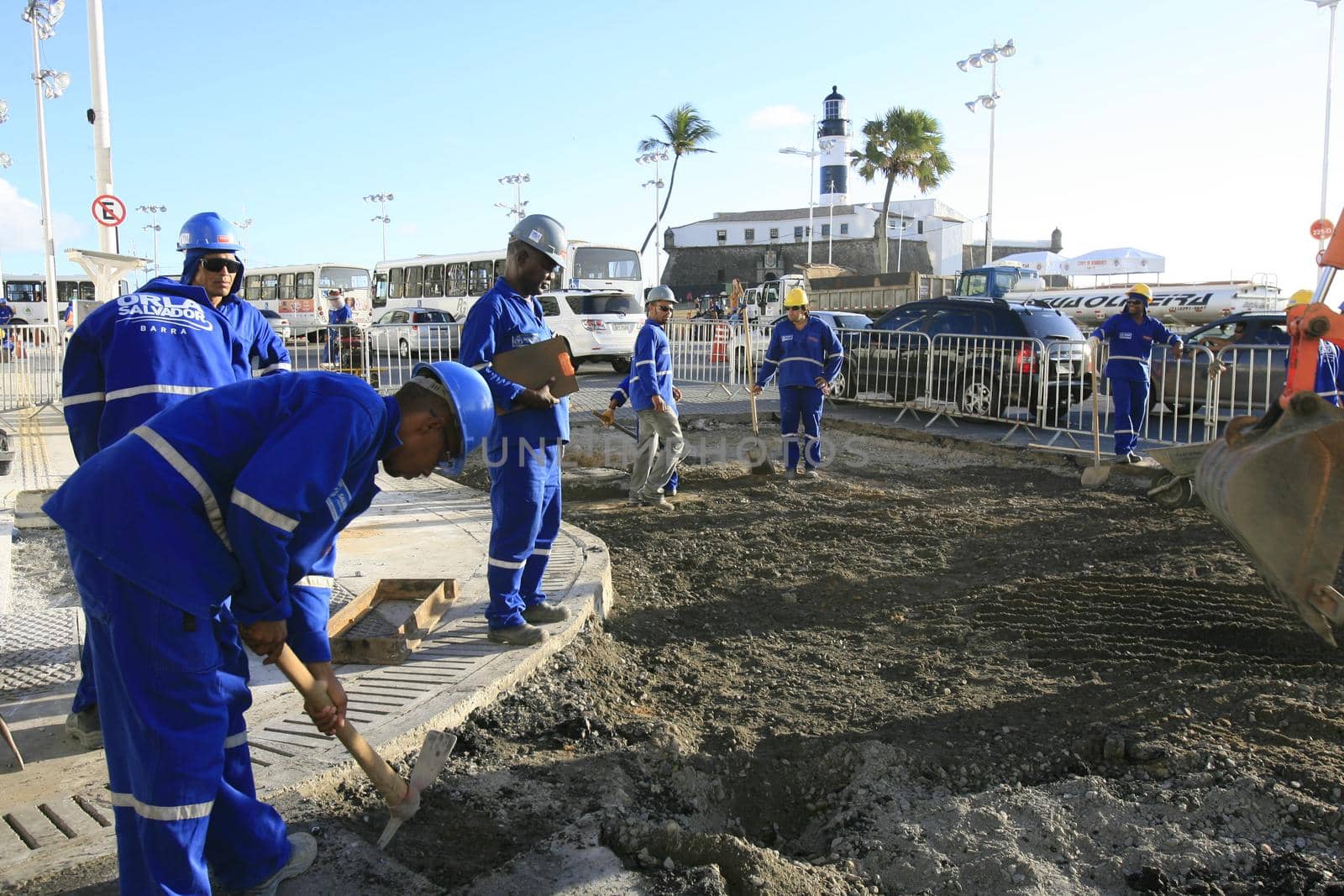 salvador, bahia, brazil - march 6, 2014: Workers working on street stretch revitalization works in Barra neighborhood in Salvador city.