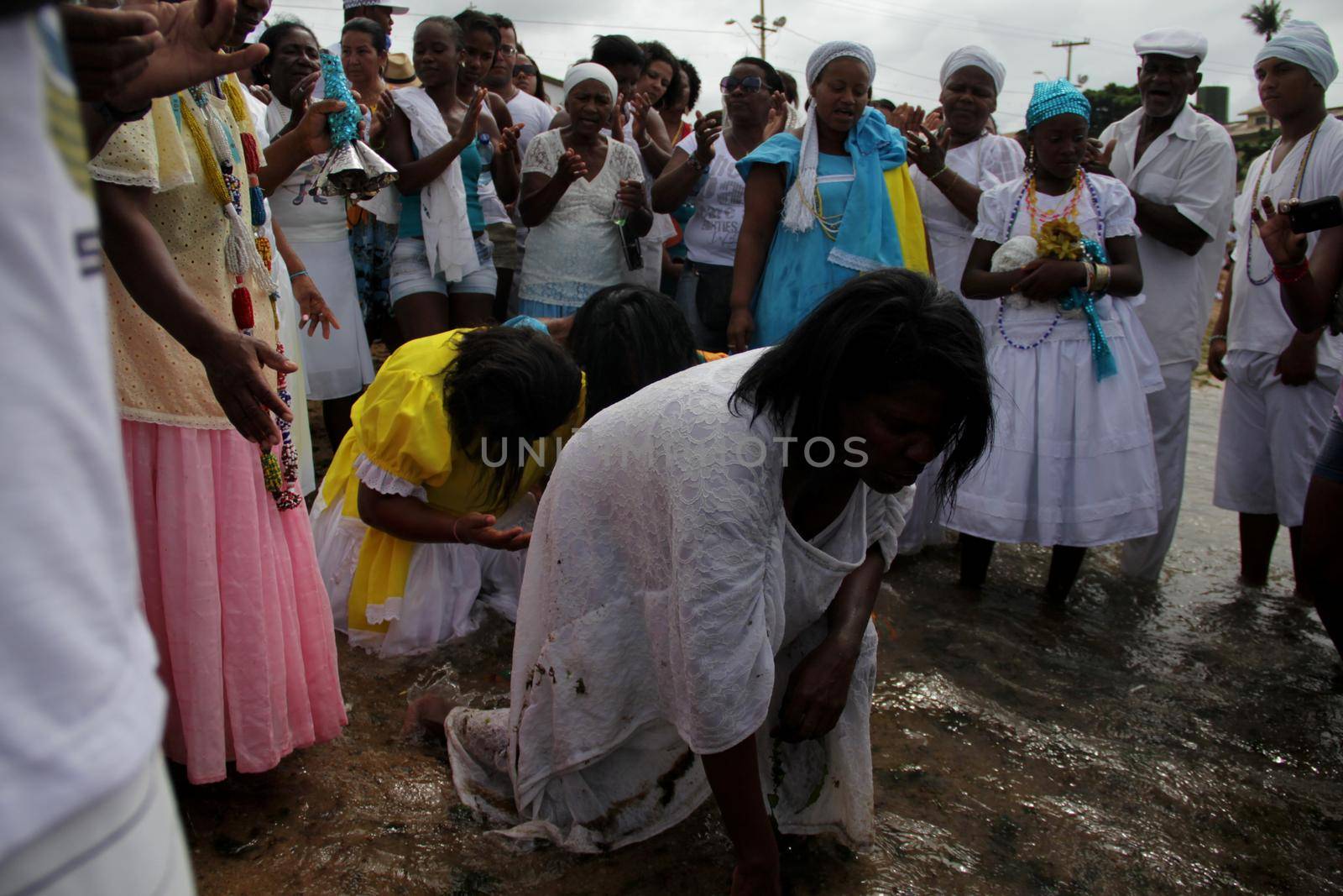 salvador, bahia, brazil - february 2, 2014: member of the candomble religion participates in a party in honor of Yemanja in the city of Salvador.