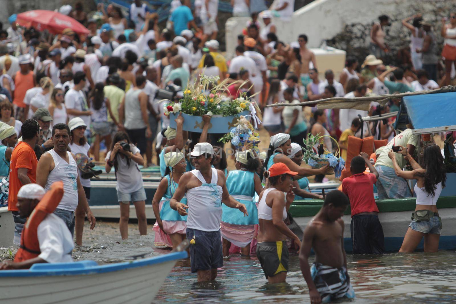 salvador, bahia, brazil - february 2, 2015: Candomble devotees and supporters of the African matriaz religion pay tribute to the orixa Yemanja in the city of Salvador.