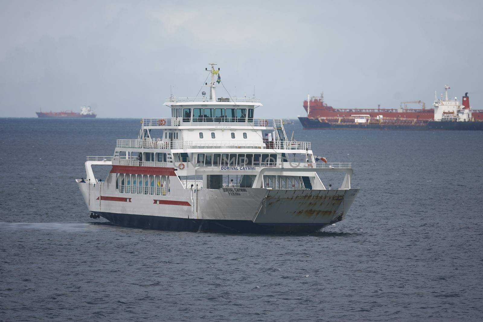 salvador, bahia, brazil - august 19, 2014: Dorival Caymmi ferry boat near Terminal de Sao Joaquim in Salvador. sweaty vessel for the crossing to the island of Itaparica.