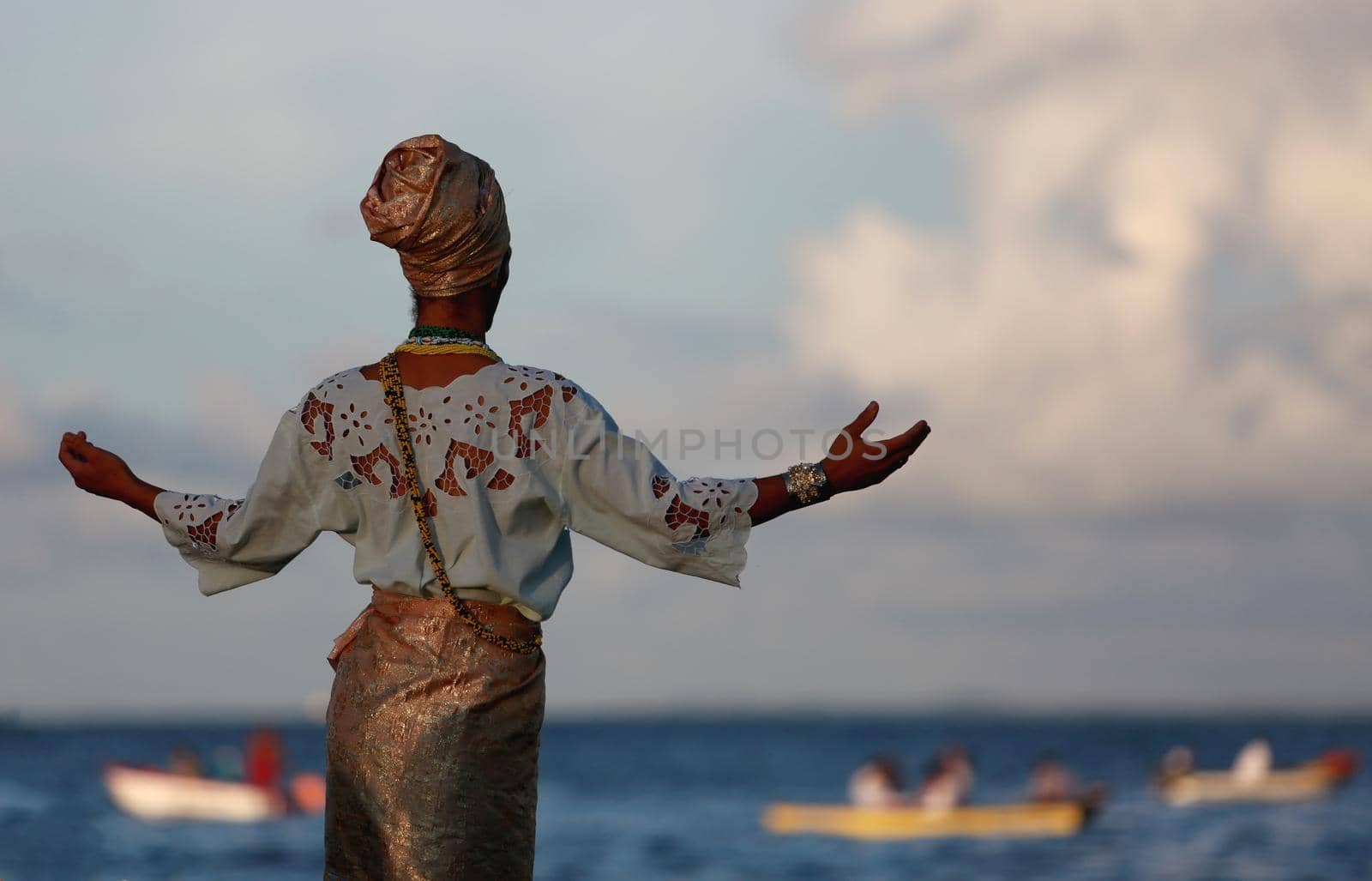 salvador, bahia / brazil - February 2, 2015: Candomble supporters and supporters greet the Yemanja orixa during a festan on the Rio Vermelho neighborhood beach in Salvador.