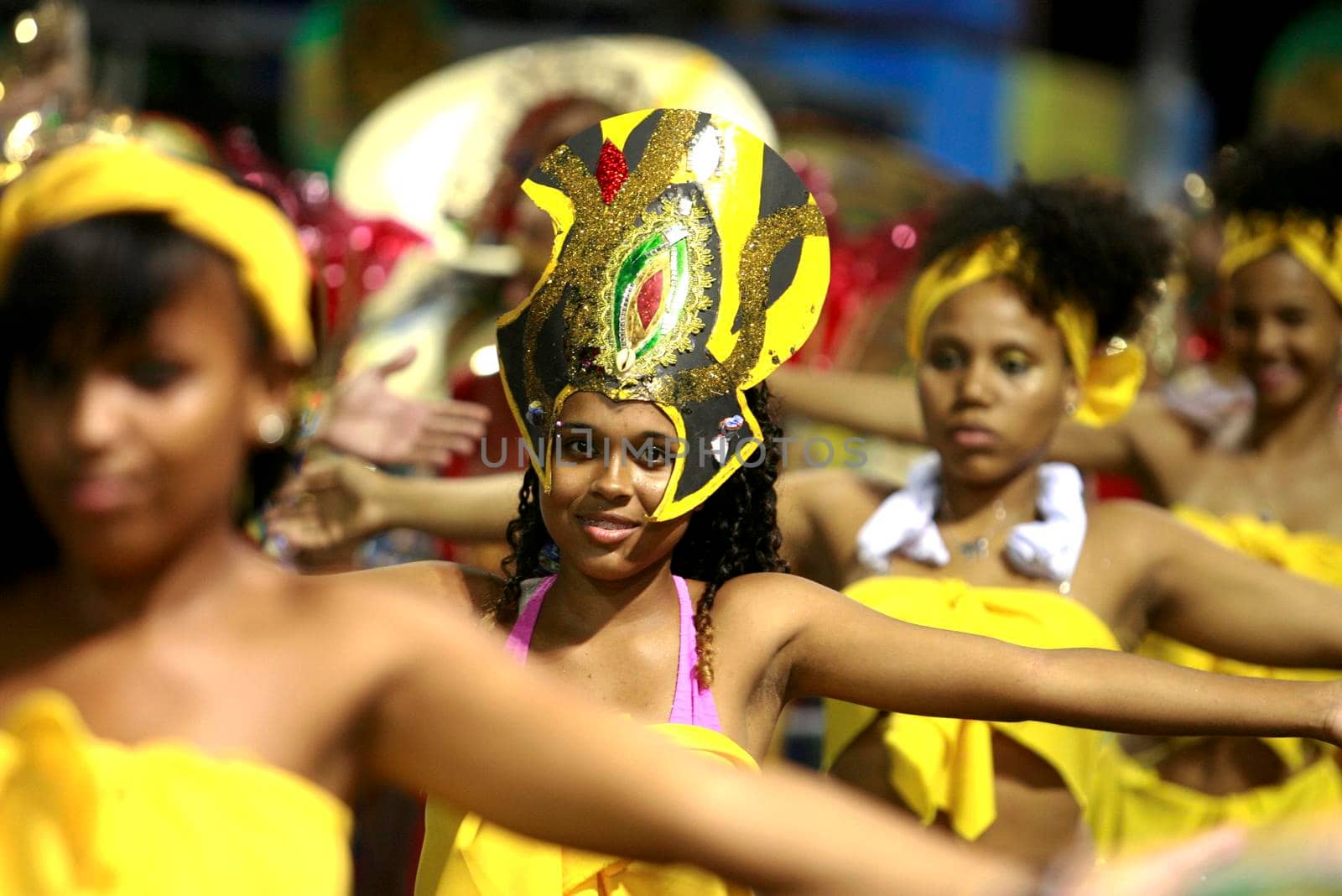 salvador, bahia / brazil - february 14, 2015: Members of the Afro Muzenza block are seen in Campo Grande during the Carnival celebrations in the city of Salvador.