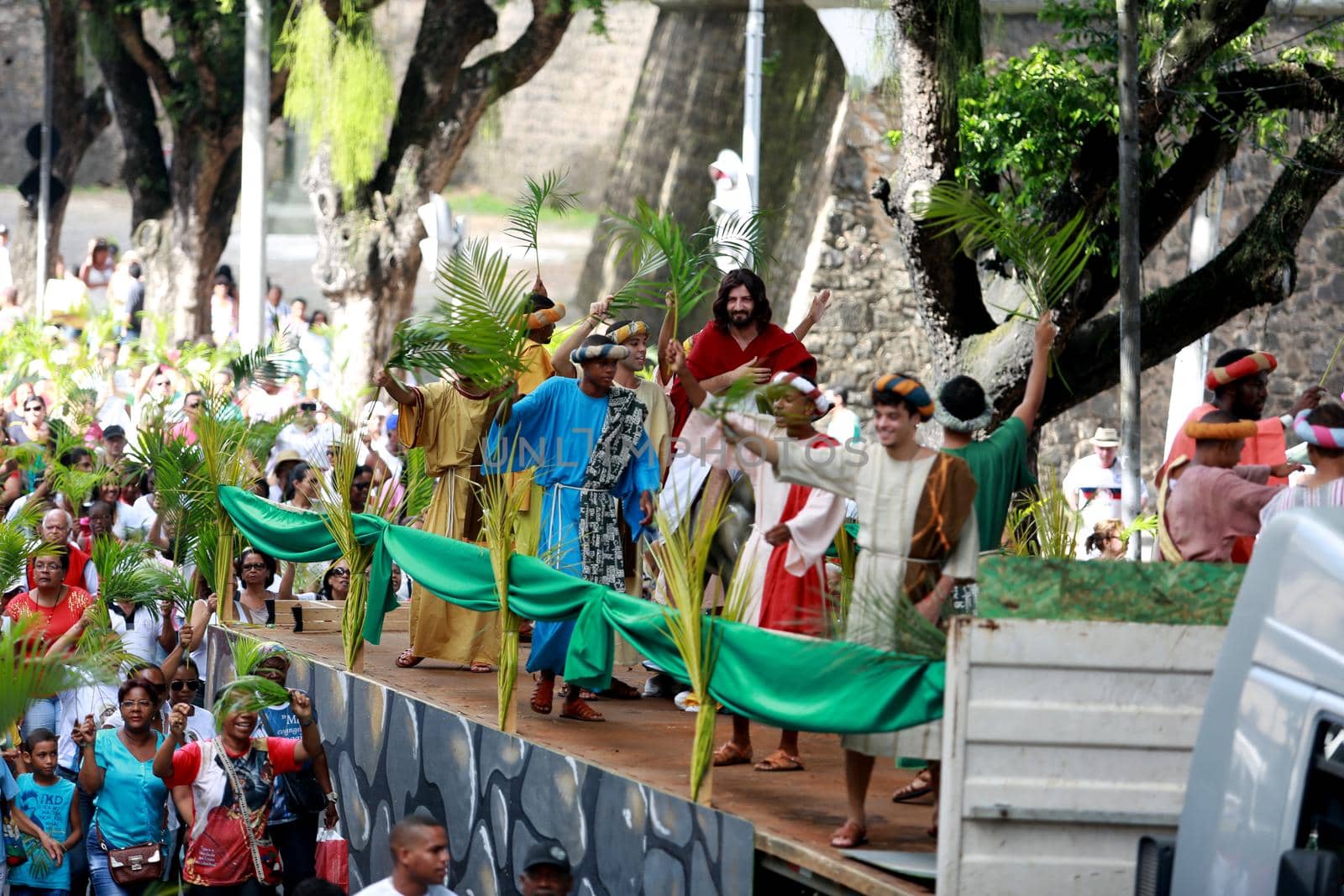 salvador, bahia, brazil - march 29, 2015: Catholics are seen carrying palm branches during procession of branches in Salvador city.