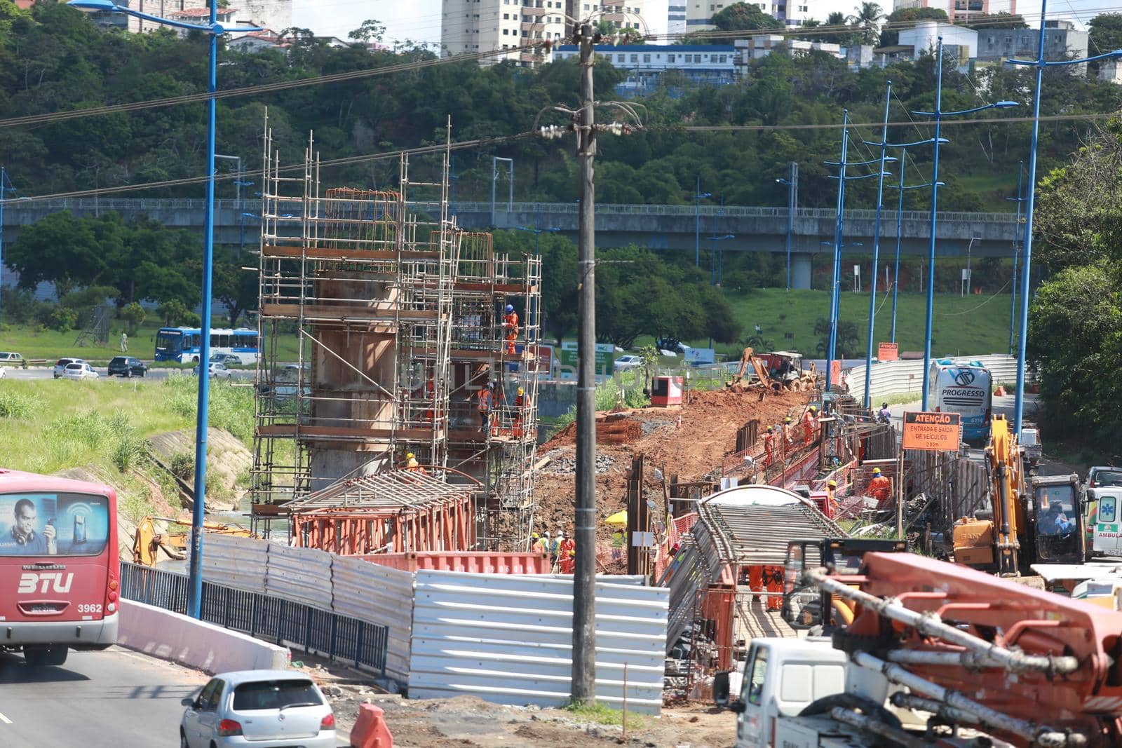 salvador, bahia / brazil - may 6, 2015: Workers work together to traffic vehicles on Avenida Antonio Carlos Magalhaes in works to expand the subway of Salvador.