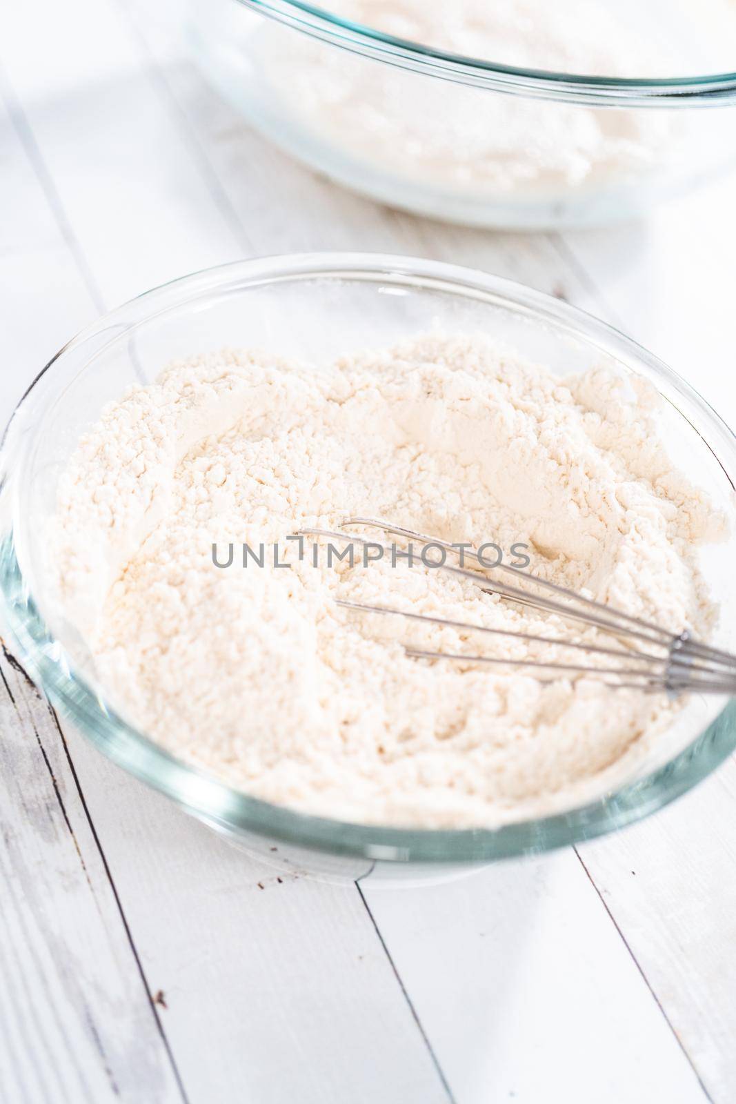 Preparing homemade pizza dough from all-purpose flour.
