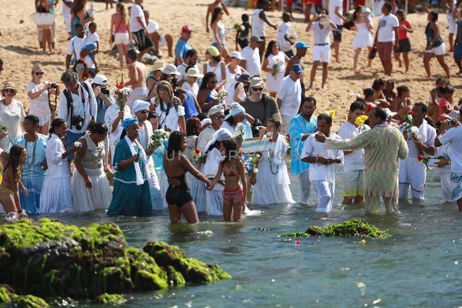 salvador, bahia, brazil - february 2, 2015: Candomble devotees and supporters of the African matriaz religion pay tribute to the orixa Yemanja in the city of Salvador.