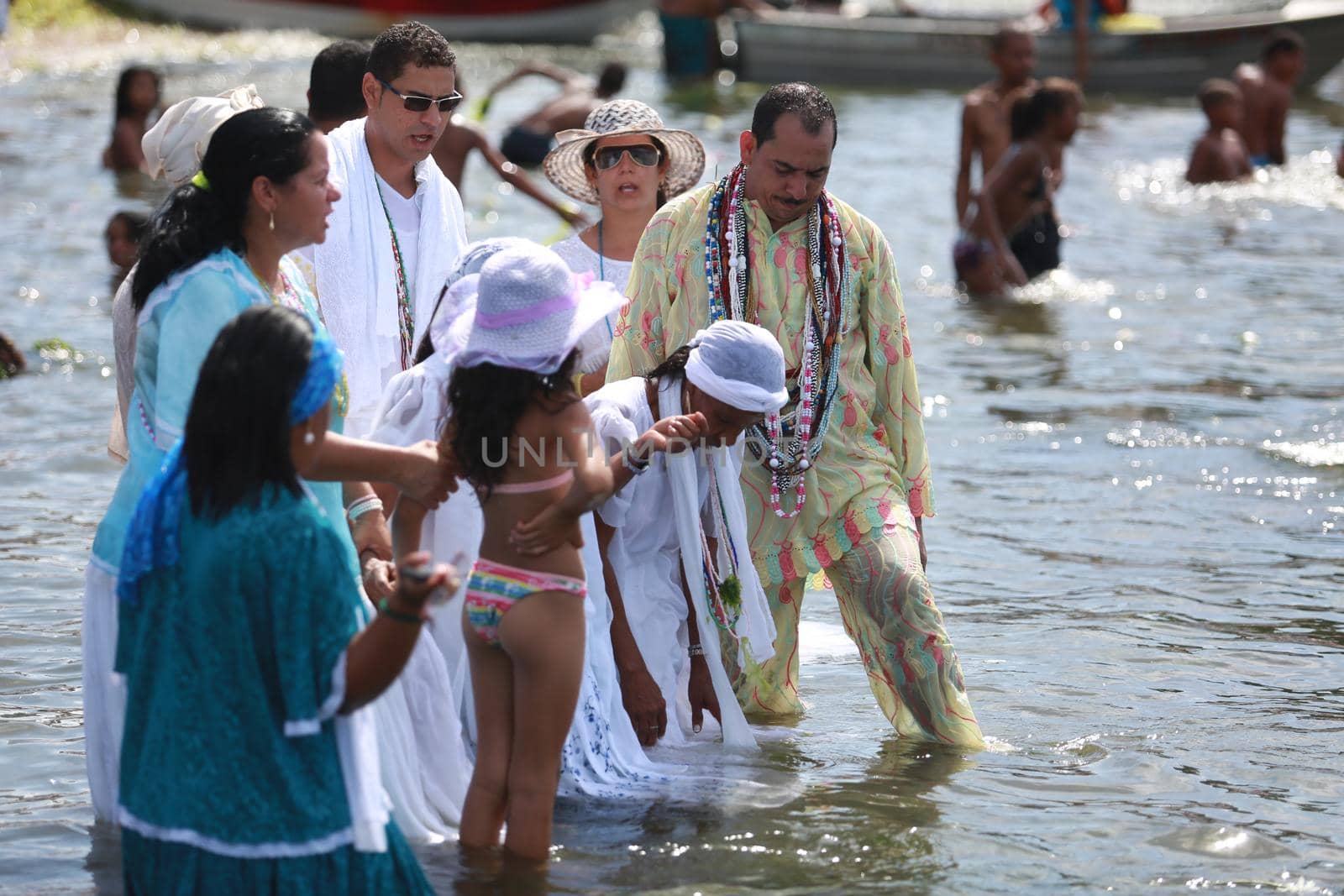 salvador, bahia, brazil - february 2, 2015: Candomble devotees and supporters of the African matriaz religion pay tribute to the orixa Yemanja in the city of Salvador.