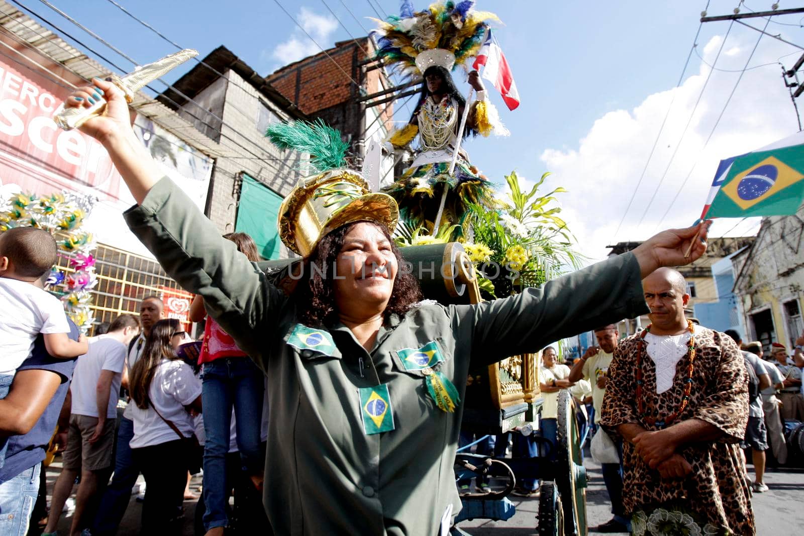 salvador, bahia / brazil - july 2, 2015: person wears the costume of Maria Quiteria, a Bahian character who fought during independence from Bahia. She put on men's clothes to join the Brazilian Army.