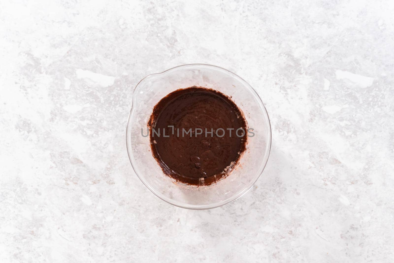Flat lay. Mixing ingredients to bake unicorn rainbow chocolate cupcakes.