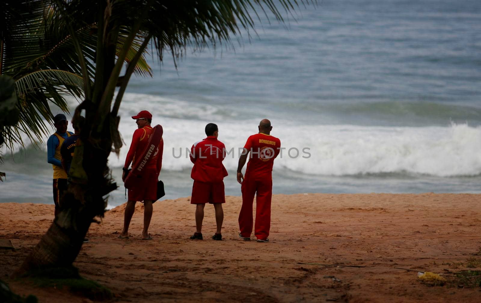 salvador, bahia / brazil - june 9, 2015: Members of the Bahia Fire Department are spotted astonishing missing persons at Stela Mares Beach in Salvador.