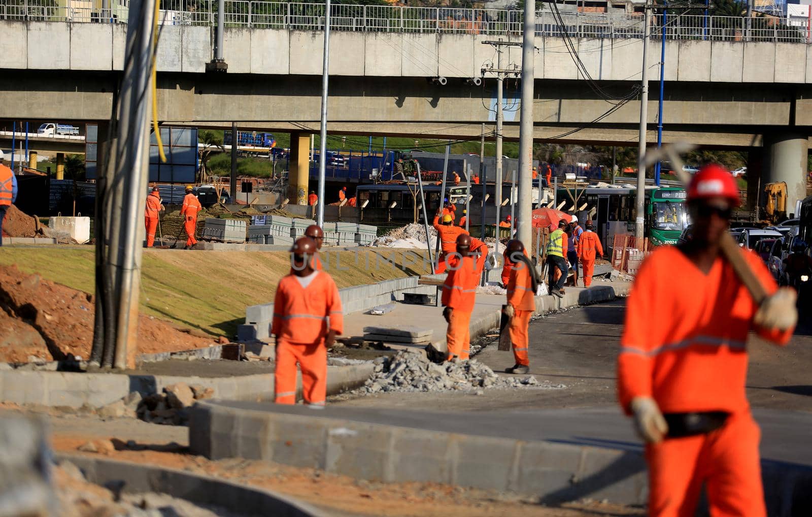 salvador, bahia, brazil - september 16, 2015: Workers are seen working on the construction of the bus station next to the metro station in Rótula do Abacaxi in the city of Salvador.