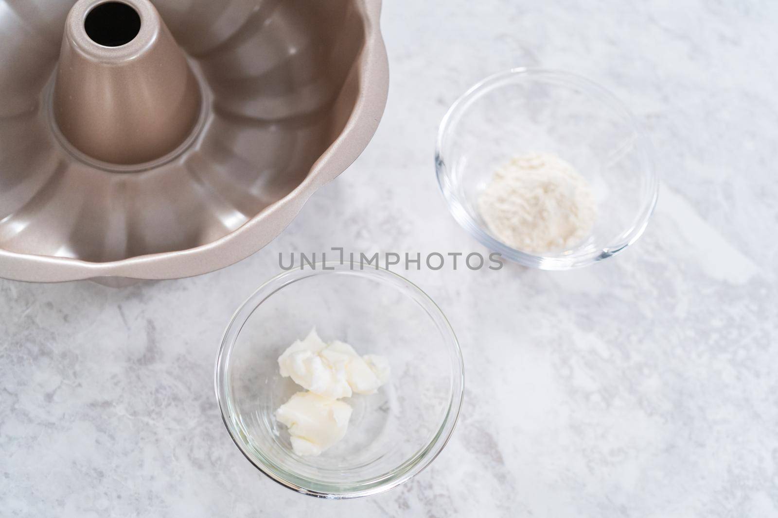 Greasing bundt cake pan to bake July 4th bundt cake with chocolate stars.