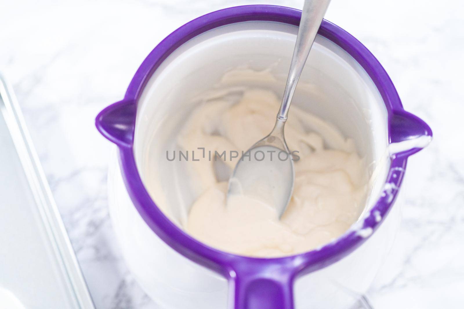 Melting white chocolates to make white chocolate stars.