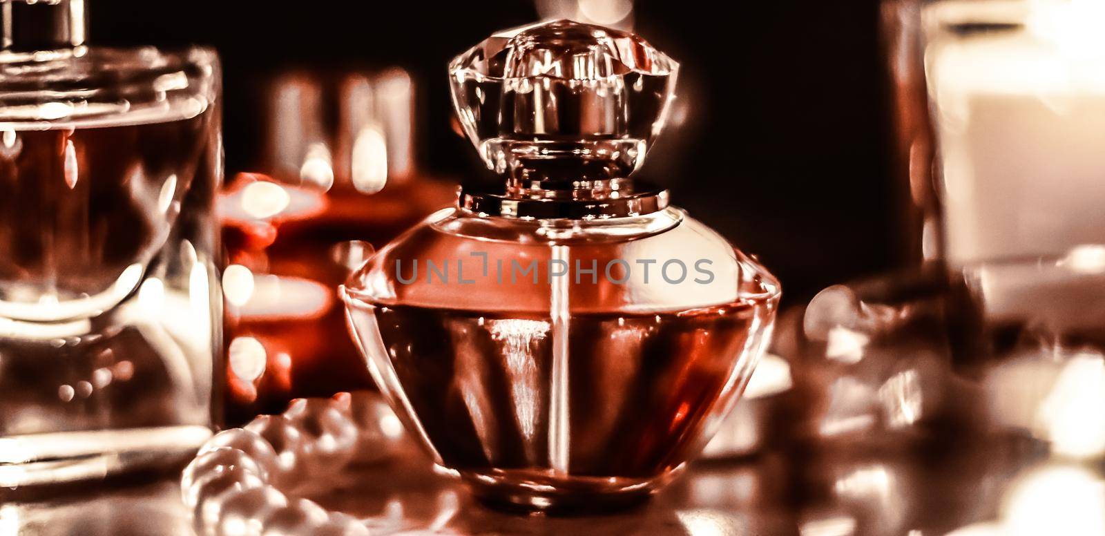 Perfume bottle and vintage fragrance on glamour vanity table at night, pearls jewellery and eau de parfum as holiday gift, luxury beauty brand present by Anneleven
