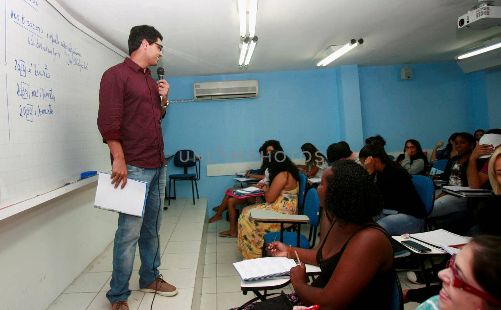 salvador, bahia / brazil - september 15, 2015: teacher is seen in the classroom in a preparatory course for public competition in the city of Salvador.