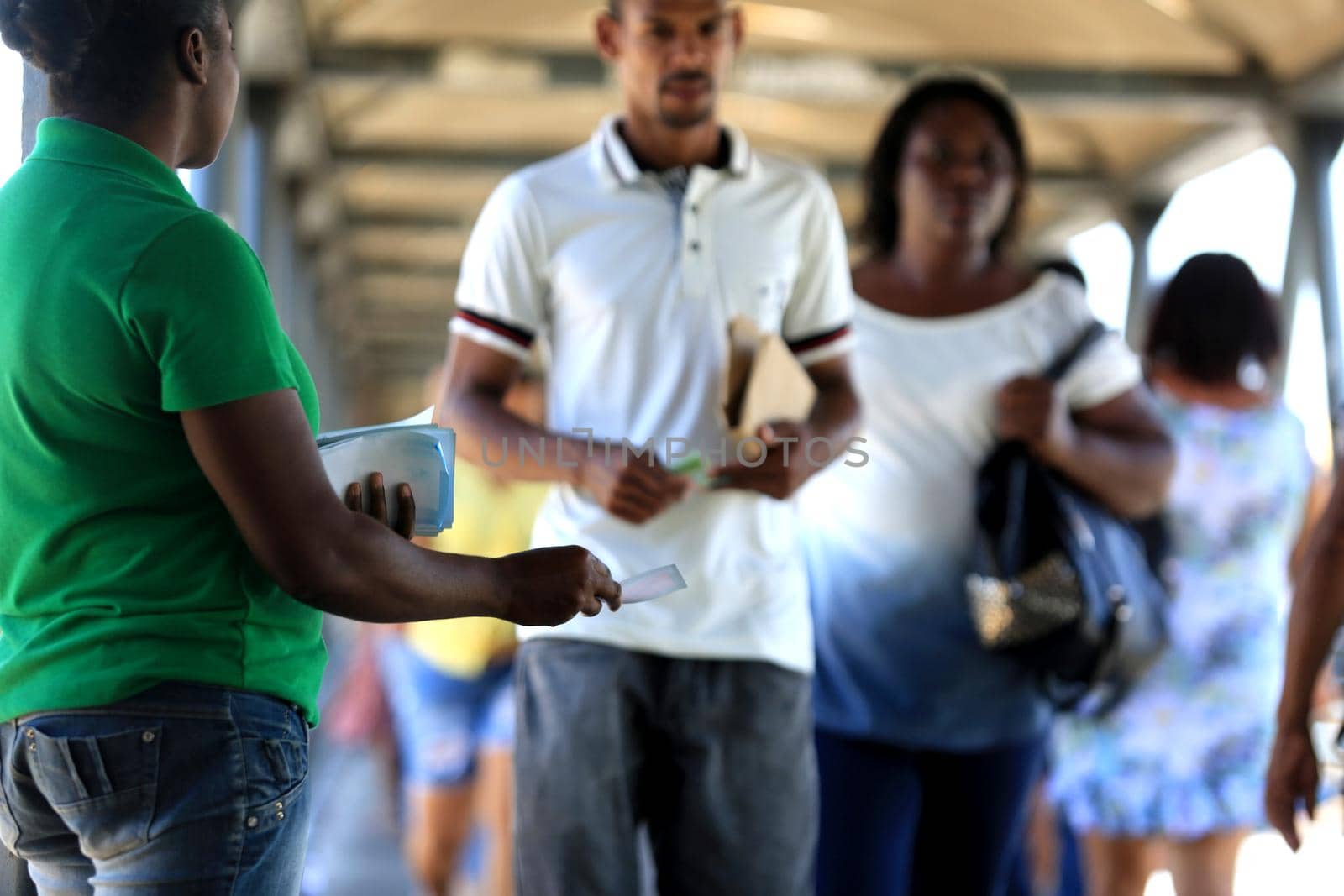 salvador, bahia / brazil - november 12, 2015: person is seen distributing advertising pamphlet in the city of Salvador.



