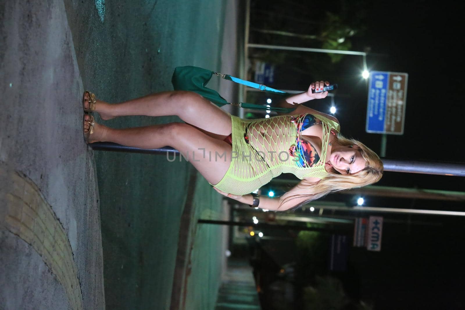 salvador, bahia, brazil - october 5, 2015: Trans woman working as a prostitute on a street in Salvador city.