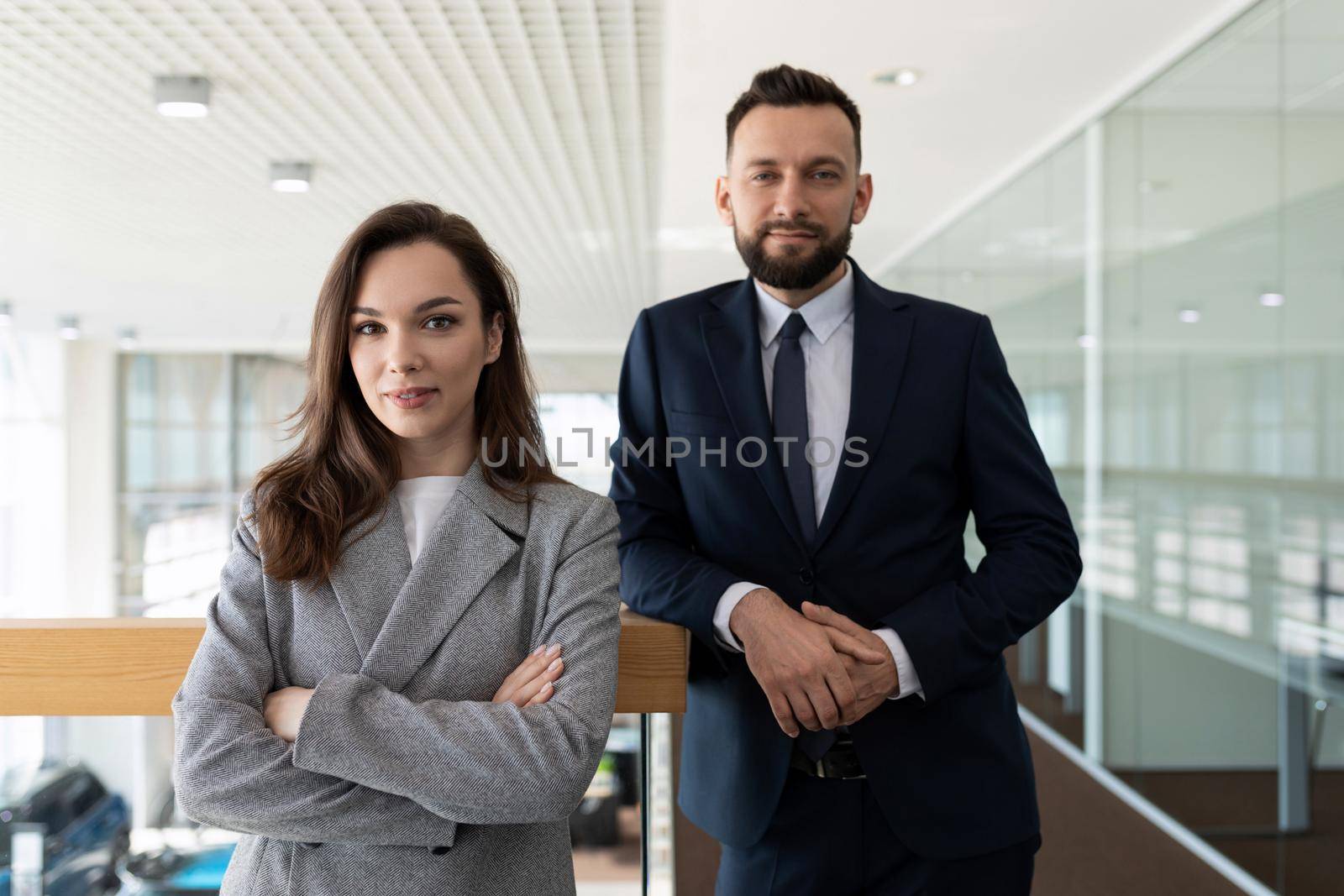 portrait of a man and a woman in formal clothes representative employees of the company, concept of legal services by TRMK