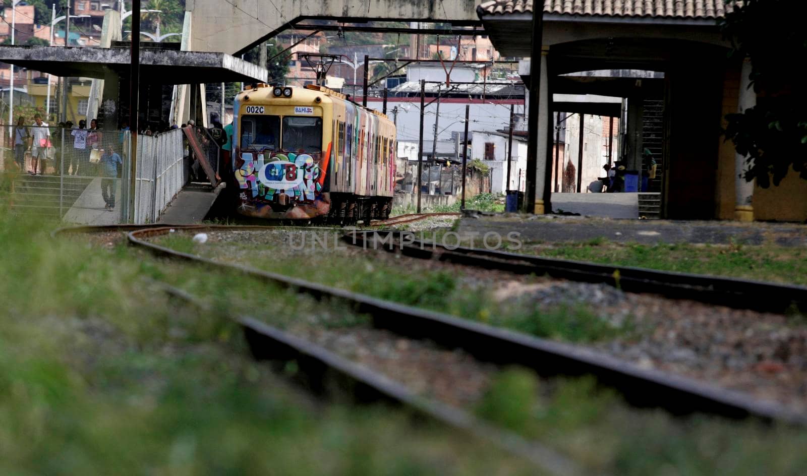 salvador, bahia / brazil - november 23, 2015: suburban train is seen passing through the Lobato neighborhood in the city of Salvador.