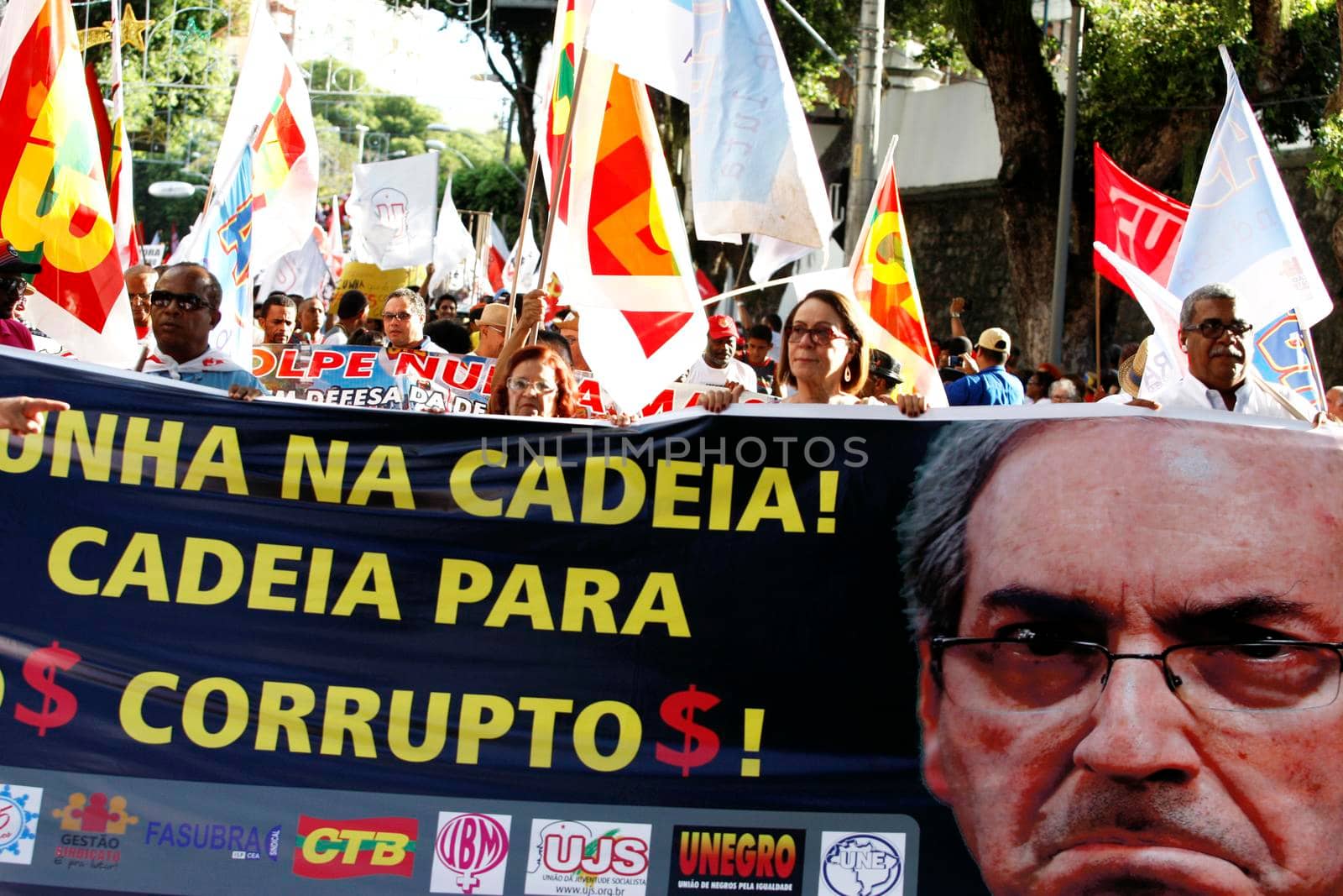 salvador, bahia, brazil - dec. 16, 2015: members of the trade union centrals, political parties and social movements mobilize in favor of president Dilma Rousseff and asking Eduardo Cunha to leave the presidency of the Chamber of Deputies.


