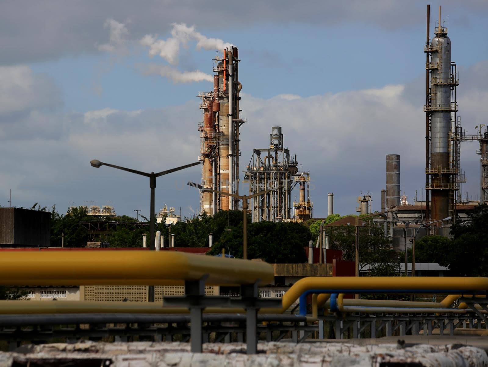 camacari, bahia / brazil - december 7, 2015: chimney emitting gas in the atmosphere is seen in factory of the Industrial Pole of Camacari.