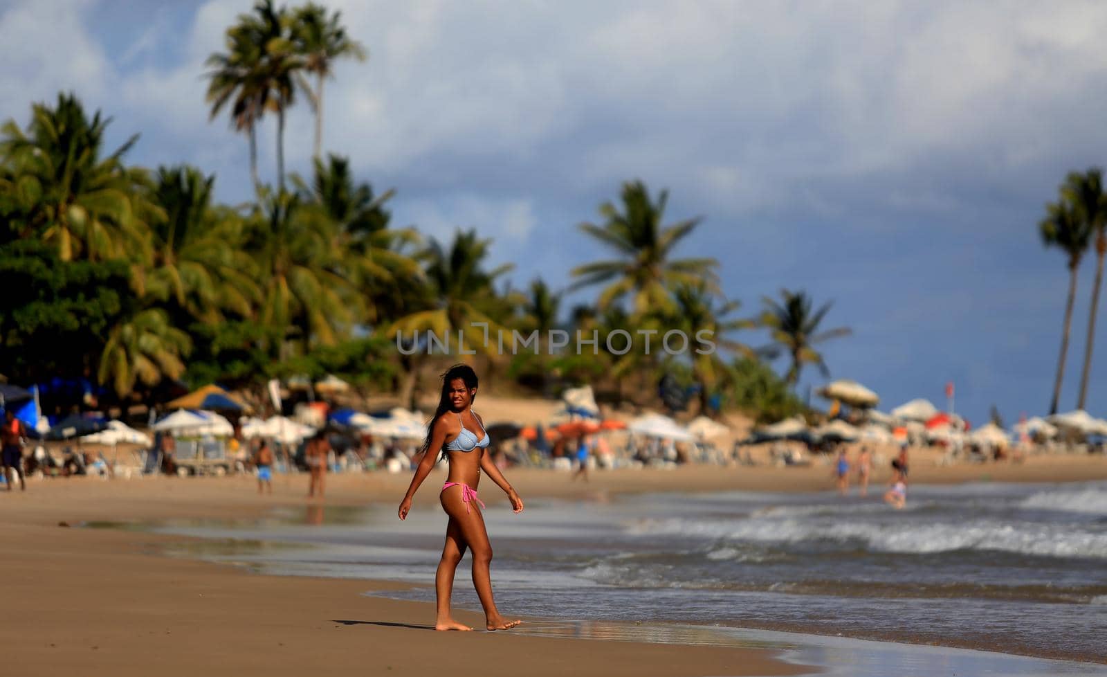 salvador, bahia / brazil - December 22, 2015: Young woman is seen on Piata Beach during the summer in Salvador city.