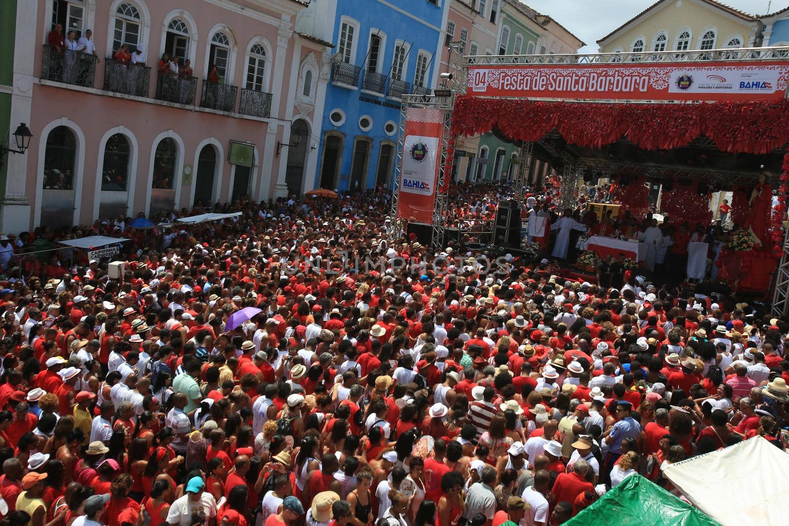salvador, bahia, brazil - december 4, 2015: Santa Barbara devotees during Mass in Praised Santa at Largo do Pelourinho in Salvador city.