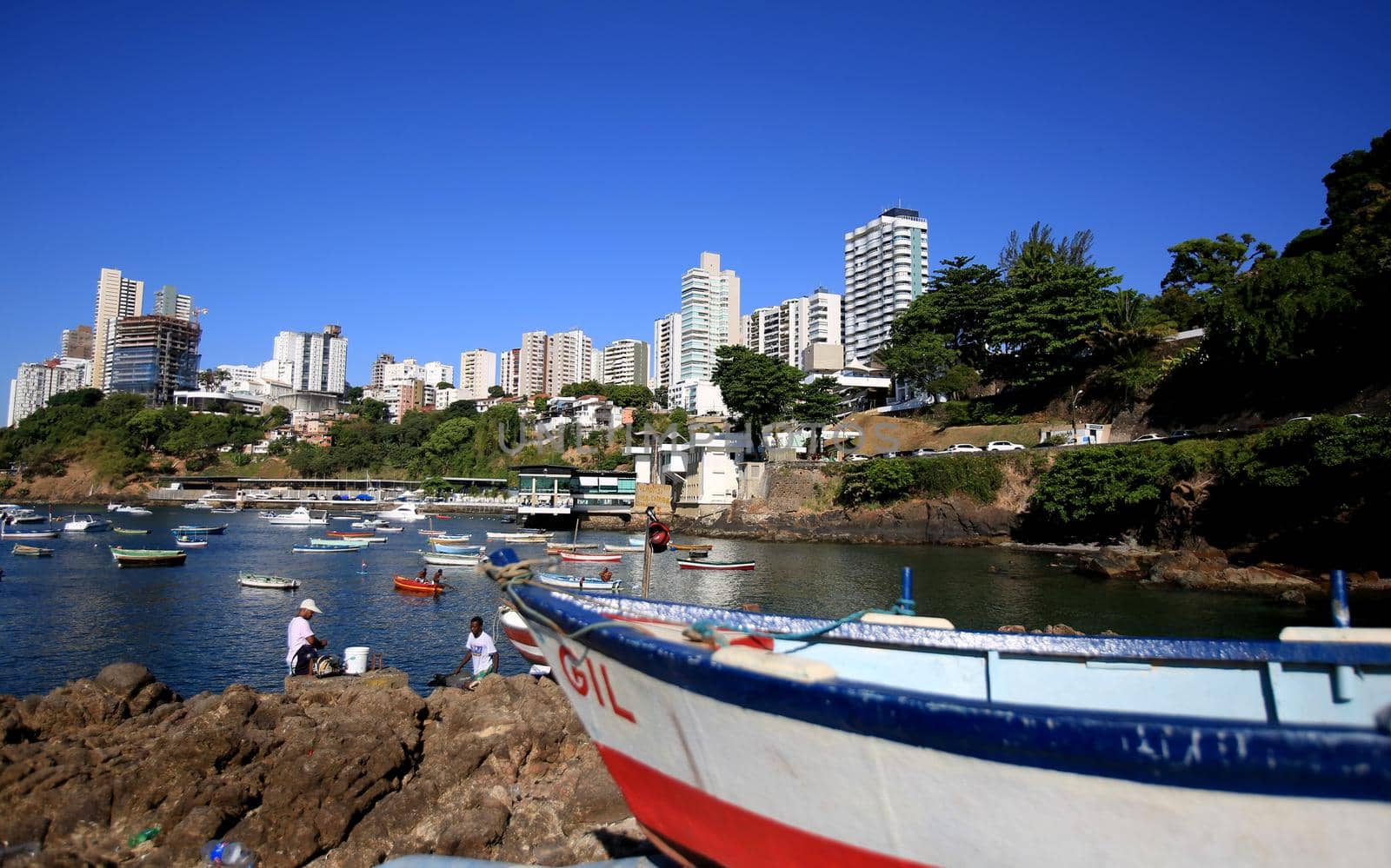 salvador, bahia / brazil - december 3, 2015: fishing boats are seen at Barra beach in the city of Salvador.