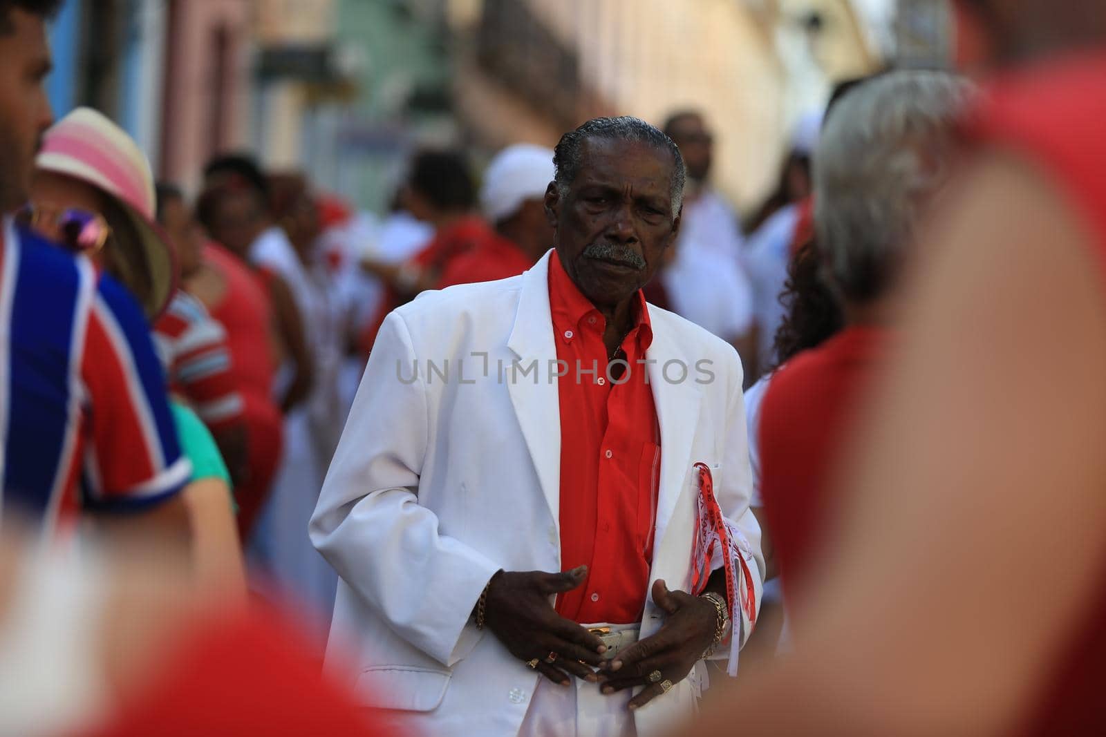 salvador, bahia, brazil - december 4, 2015: Santa Barbara devotees during Mass in Praised Santa at Largo do Pelourinho in Salvador city.