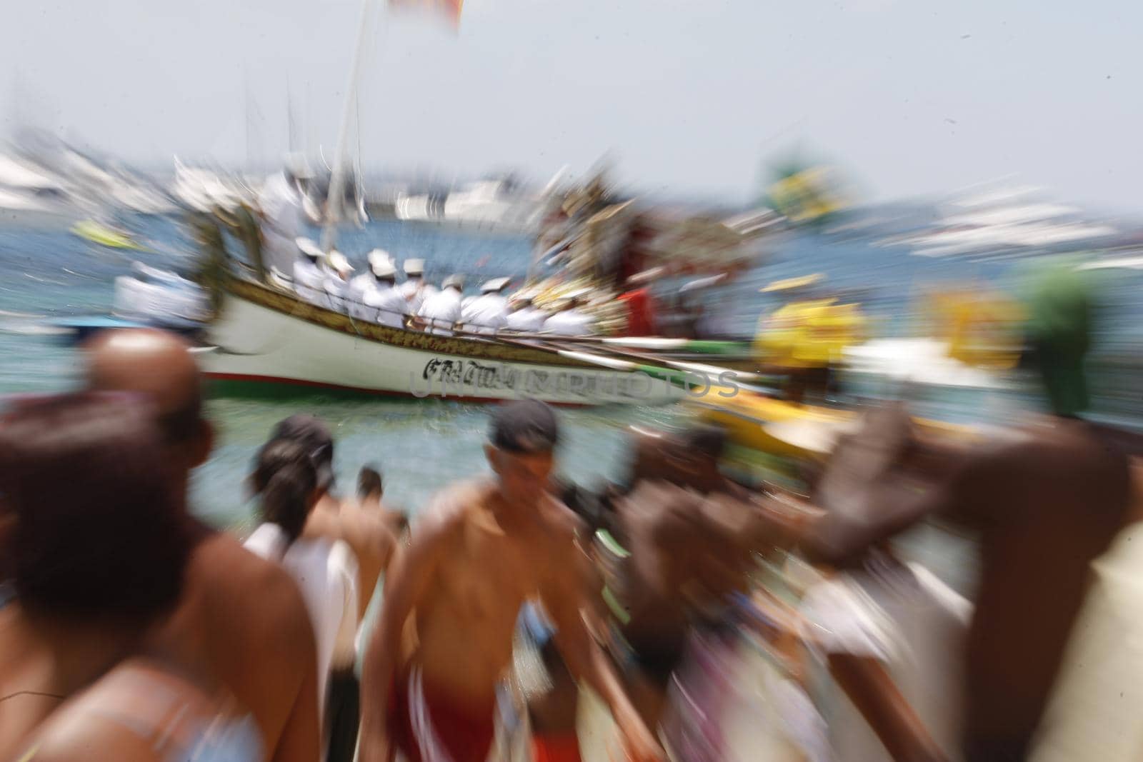 salvador, bahia / brazil - january 1, 2016: Sailors are seen aboard the Galeota Gratidao do Povo conducting the image of Bom Jesus dos Navegantes to Boa Viagem Beach in the Bay of All Saints in Salvador.