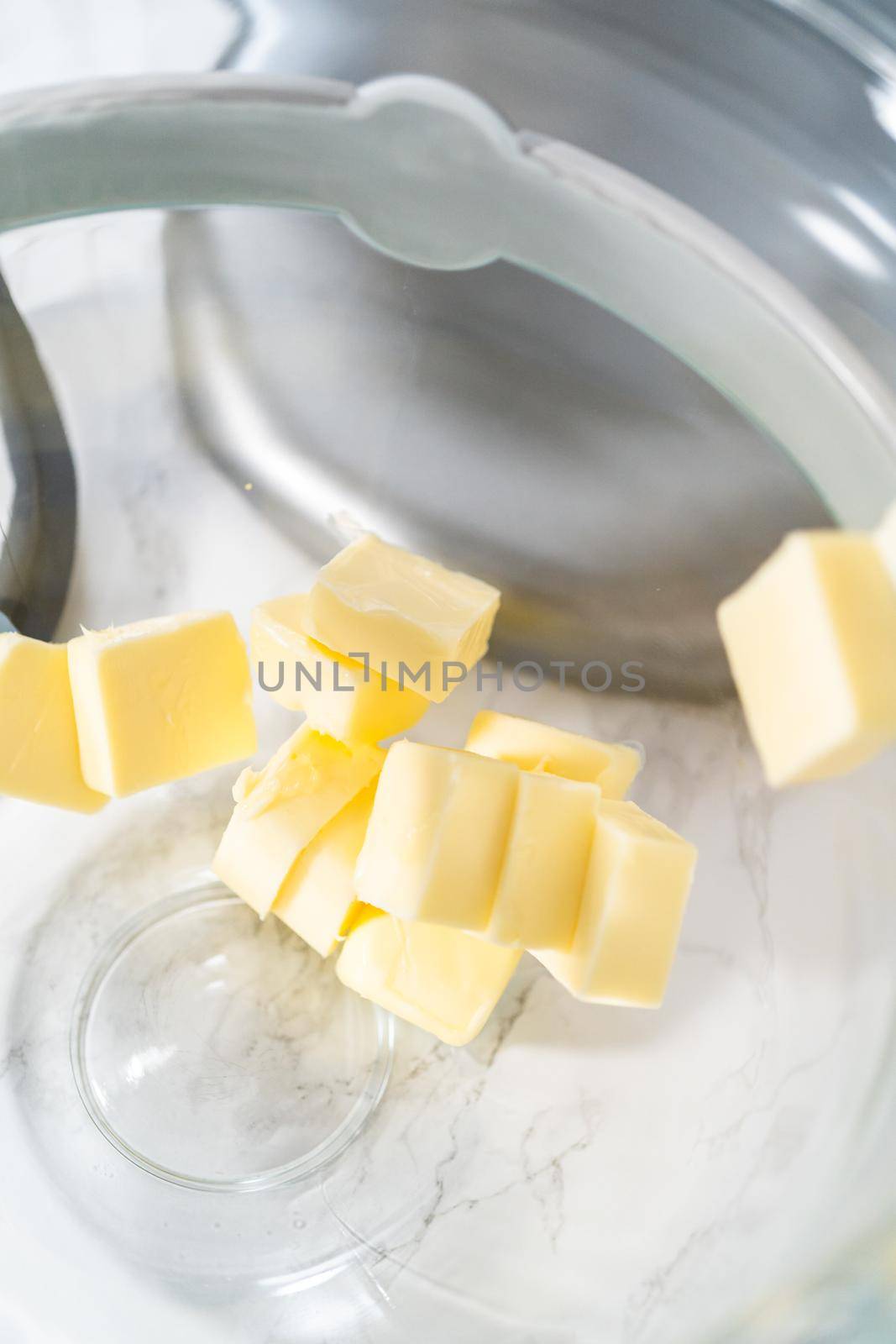 Lemon wedge cookies with lemon glaze. Mixing ingredients in kitchen mixer to bake lemon wedge cookies with lemon glaze.