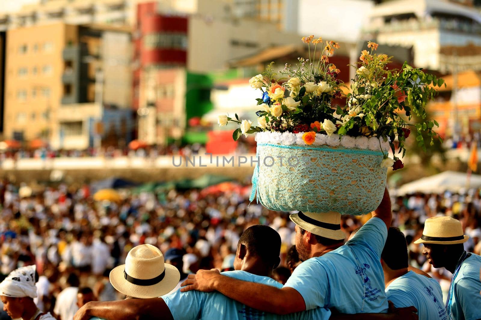 salvador, bahia / brazil - february 2, 2016: supporters of candomble are seen on the Rio Vermelho beach in the city of Salvador during a party in honor of Yemanja.