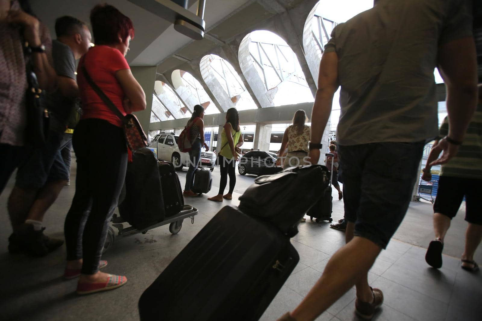 salvador, bahia, brazil - february 3, 2016: passengers carrying travel bag at airport in Salvador city.