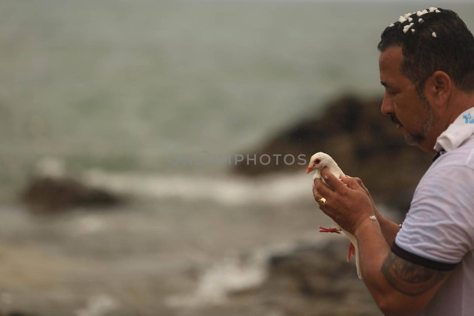 salvador, bahia / brazil - february 2, 2016: Candomble supporters and supporters greet the Yemanja orixa during a festan on the Rio Vermelho neighborhood beach in Salvador. 