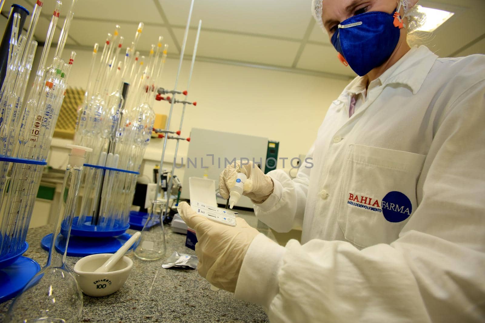 salvador, bahia / brazil - june 2, 2016: Bahiafarma employee presents kit with rapid test for Zika virus detection. The equipment is produced in the city of Salvador.
