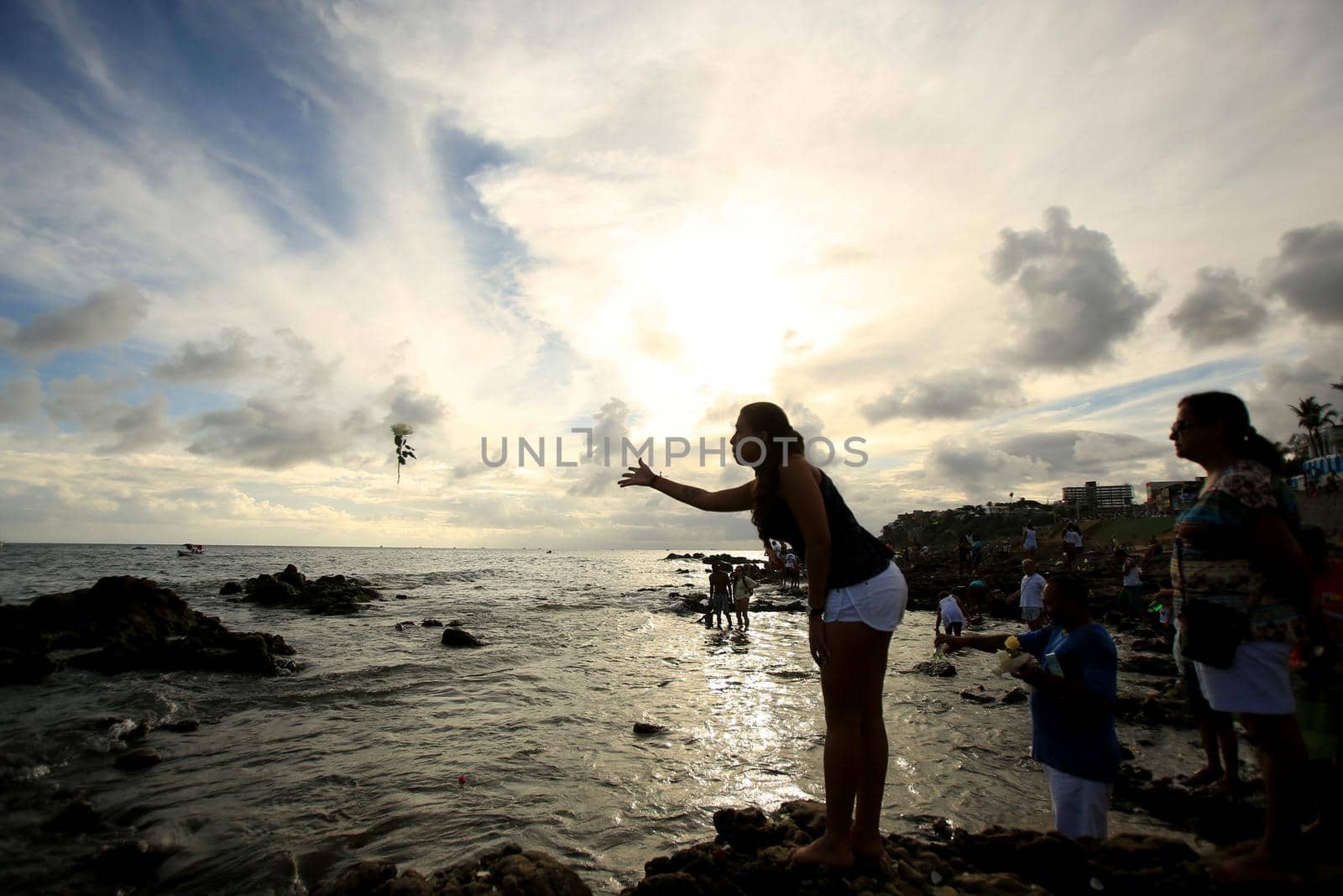 salvador, bahia, brazil - february 2, 2017: Candomble members and admirers of the Orixa Yemanja during a religious ritual in the city of Salvador.