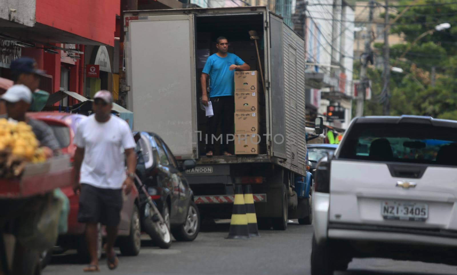 salvador, bahia / brazil - july 20, 2016: Cargo delivery truck is seen unloading orders in downtown Salvador.

