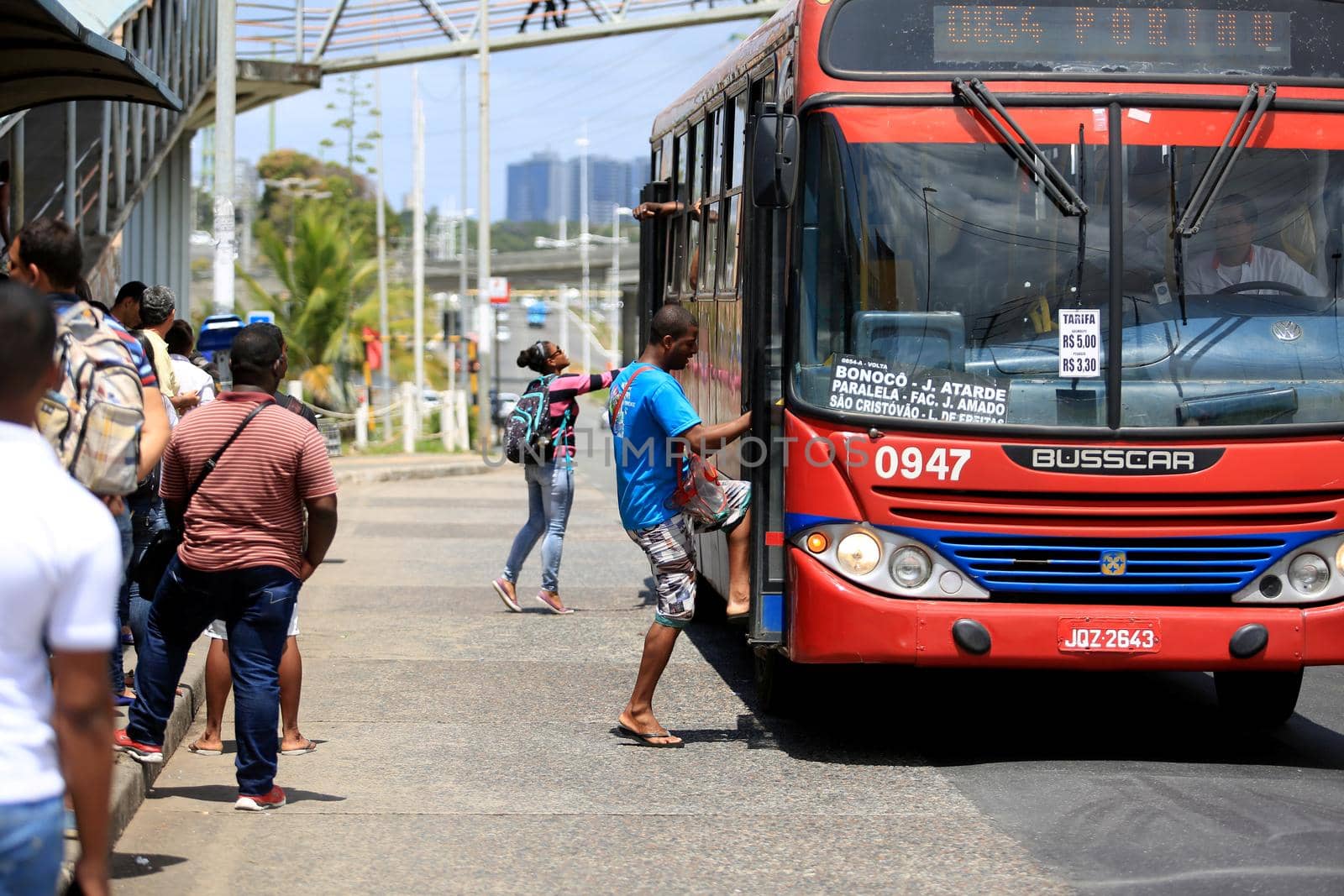 salvador, bahia / brazil - september 21, 2016: people are vehicles and collective bus stop on Avenida Luiz Viana, in the city of Salvador.

