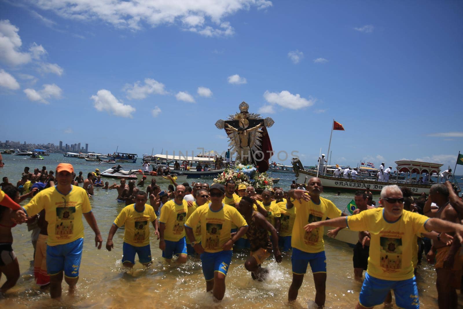 salvador, bahia, brazil - january 1, 2017: image of Bom Jesus dos Navegantes being carried by devotees on Boa Viagem beach after crossing the sea at Baia de Todos os Santos in Salvador.