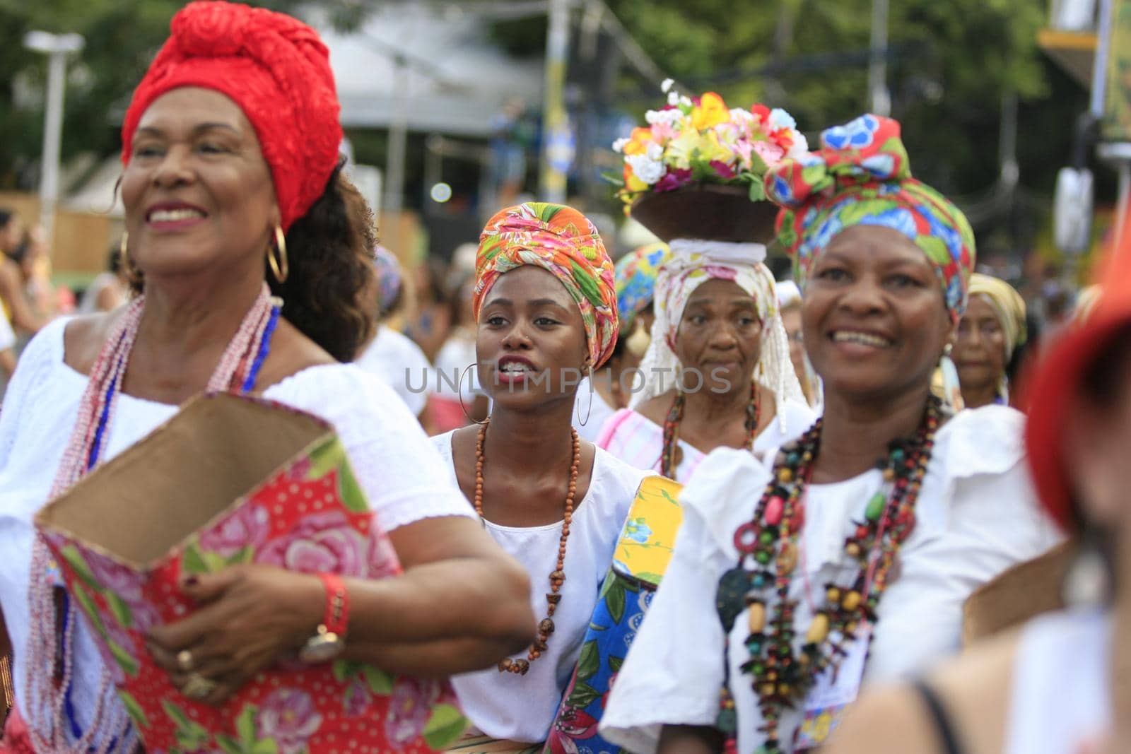 salvador, bahia / brazil - february 24, 2017: Members of The Itapua Ganhadeiras Cultural Group are seen during presentation at the Carnival in the city of Salvador.