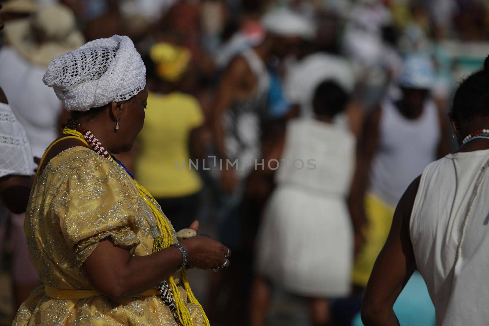 salvador, bahia / brazil - february 2, 2017: Candomble supporters and supporters greet the Yemanja orixa during a festan on the Rio Vermelho neighborhood beach in Salvador.