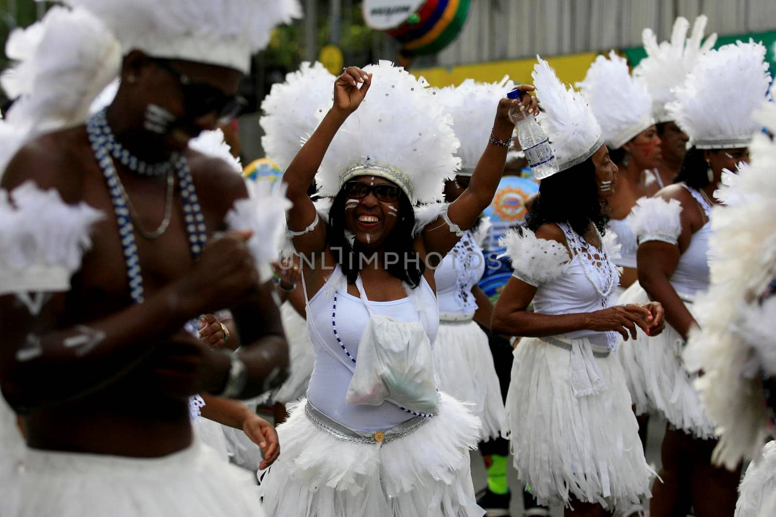 salvador, bahia, brazil - february 24, 2017: Members of the Commanches carnival block are seen during a parade on the Salvador city's carnival circuit.