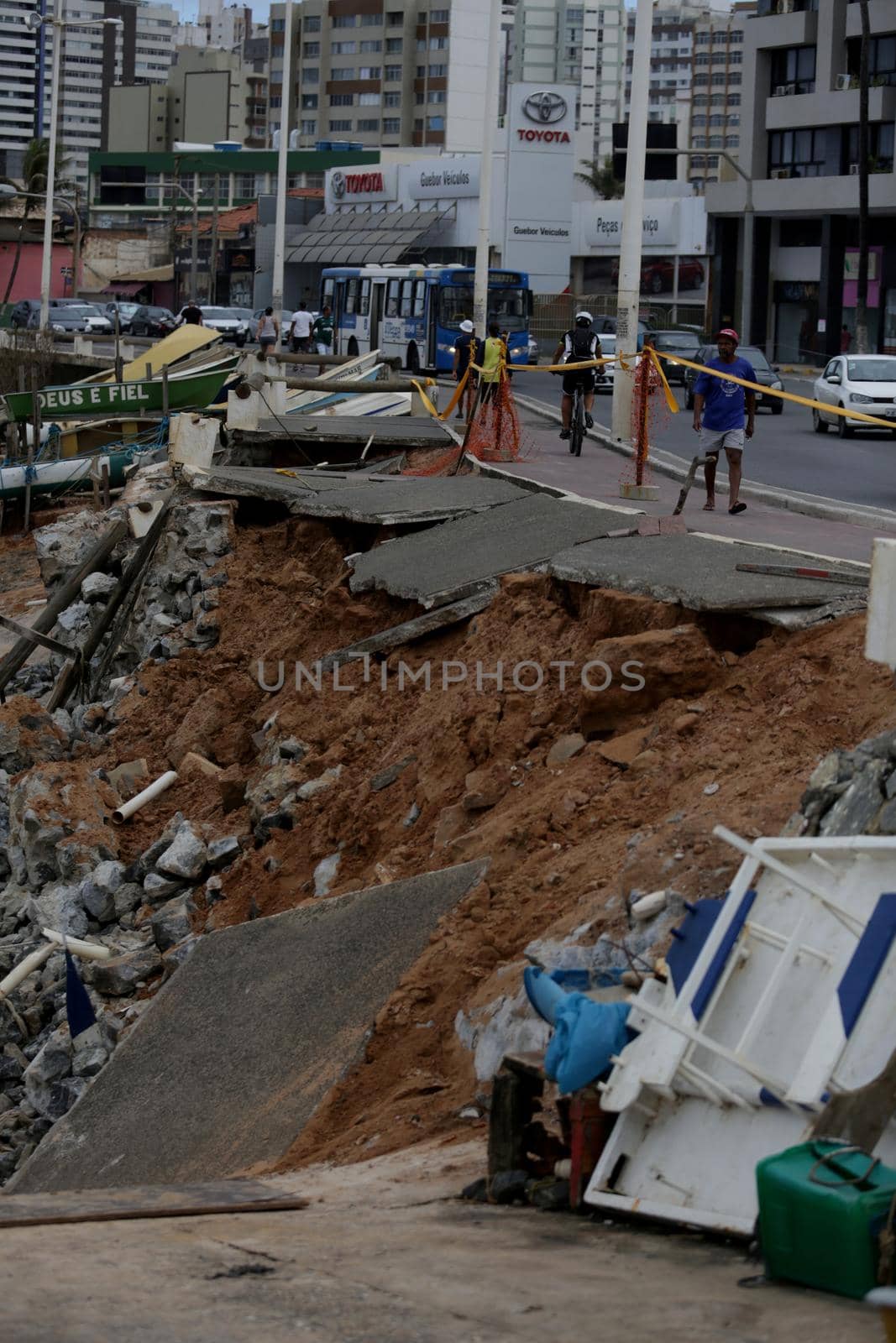 salvador, bahia / brazil - may 30, 2017: View of destruction caused by the force of the tide on the pedestrian sidewalk and bike lane area in the neighborhood of Pituba in the city of Salvador.