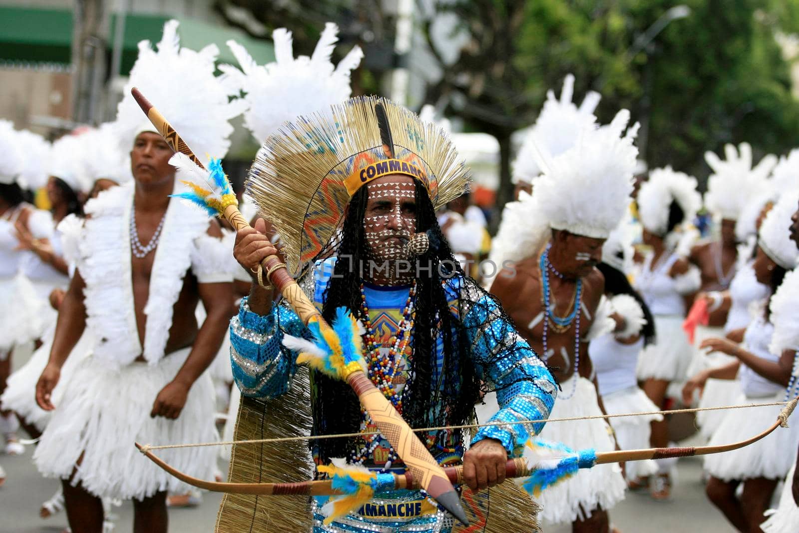 salvador, bahia, brazil - february 24, 2017: Members of the Commanches carnival block are seen during a parade on the Salvador city's carnival circuit.