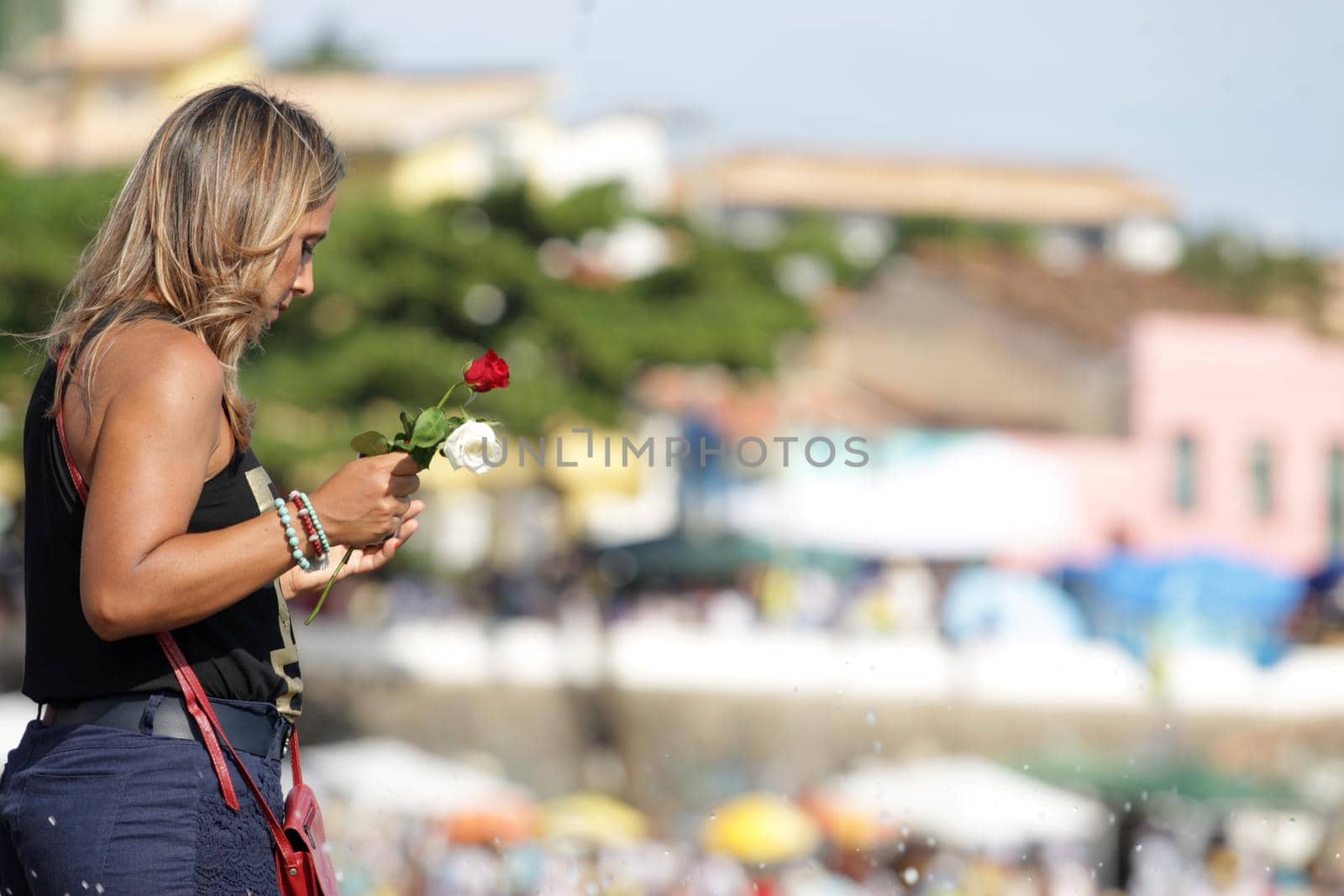 salvador, bahia, brazil - february 2, 2017: Candomble members and admirers of the Orixa Yemanja during a religious ritual in the city of Salvador.