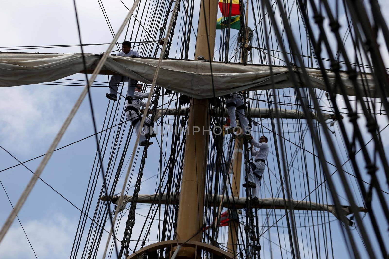 salvador, bahia, brazil - october 19, 2018: crew member of the Brazilian Navy's Cisne Branco are seen working on the vessel in the waters of the Todos os Santos Bay, in the city of Salvador.